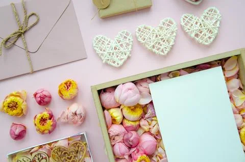 Valentine's Day composition. Flat lay of white hearts, gift boxes. Stock Photos