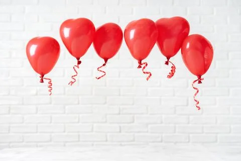 Valentines Day composition with red ballons on white Stock Photos