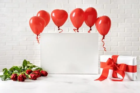Valentines Day composition with red ballons on white Stock Photos