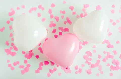 Valentines day composition. White background with white and pink heart shap.. Stock Photos