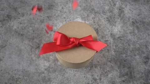 Valentine's Day concept with heart shape falling on gray background Stock Footage 84201218