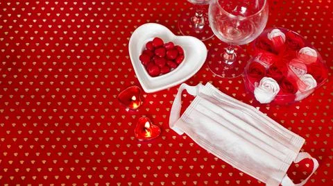 Valentines day concept table. romantic dinner with medical mask Stock Photos