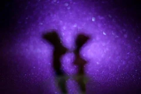 Valentine's day creative blurred banner silhouette of a couple in love on a Stock Photos