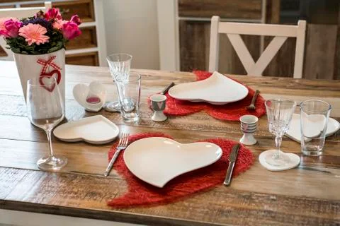 Valentines day dinner setting romantic love for two wooden table red heart sh Stock Photos