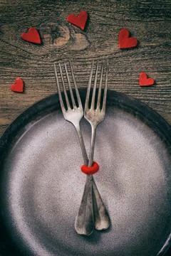 Valentines day dinner with table setting in rustic wood Stock Photos