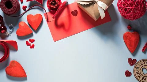 Valentine's Day flat lay template in red and cold gray colors with copy space Stock Photos