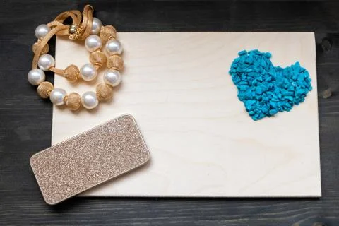 Valentine's day frame composition and beads. Blue hearts blank sheet of paper Stock Photos