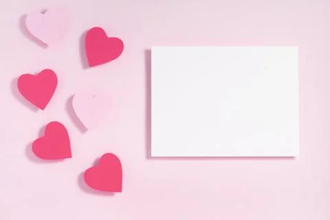 Valentine's day frame composition. Purple pink hearts blank sheet of paper on Stock Photos