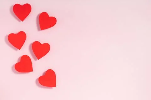 Valentine's day frame composition. Red hearts on pastel pink background. Top  Stock Photos