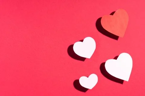 Valentine's day frame composition. Red white hearts on red background. Top vi Stock Photos