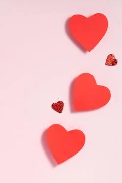 Valentine's day frame composition. Red hearts on pastel pink background. Top Stock Photos