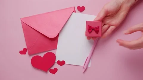 Valentine's Day gift. Ring, proposal of marriage, top view Stock Footage 144197354