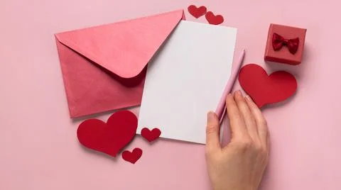 Valentine's Day gift. Ring, proposal of marriage, flat lay Stock Photos