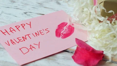 Valentine's day love card on rustic wood background, 4k dolly shot Video stock 71363765