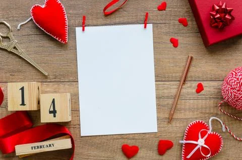 Valentines day mockup. Flat lay composition from red hearts, ribbon, perpetual Stock Photos