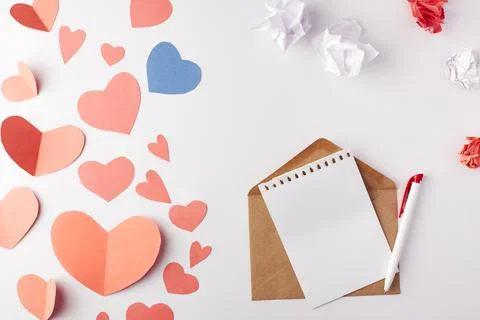 Valentine's Day, a note with an envelope and a pen Stock Photos