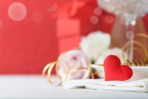 Valentines Day or Romantic dinner concept. Romantic table setting, silverware Stock Photos