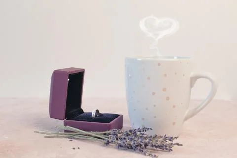 Valentines day romantic dinner table setting marry me wedding engagement ring in Stock Photos