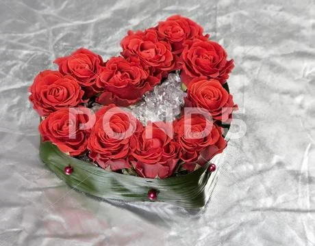 Valentine's day rose decoration bouquet on silver Stock Photos