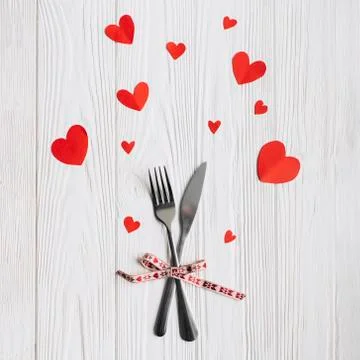 Valentines day table setting with fork, knife and red dinner 스톡 사진