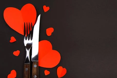 Valentines day table setting with  knife, fork and hearts/ Holidays backgroun Stock Photos