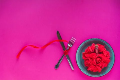 Valentine's day table setting on red background with copy space Stock Photos