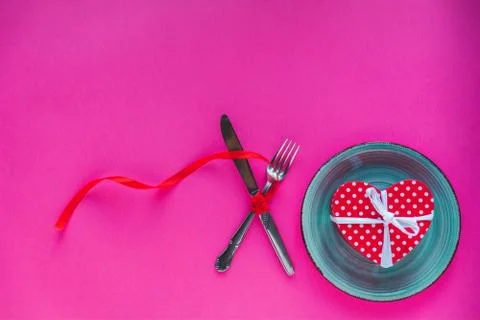 Valentine's day table setting on red background with copy space Stock Photos