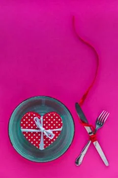 Valentine's day table setting on red background with copy space Stock Photos
