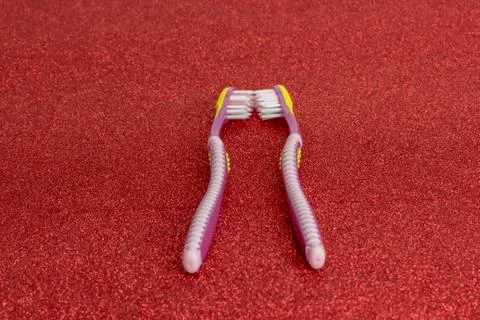 Valentine's Day Toothbrush romance. Stock-Fotos