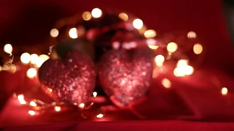 By Valentine's day. Two hearts on the background of flashing lights Stock Footage 100742246
