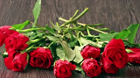 Valentines day's arrangements with red roses and heart over gray background Stock Footage 59163525