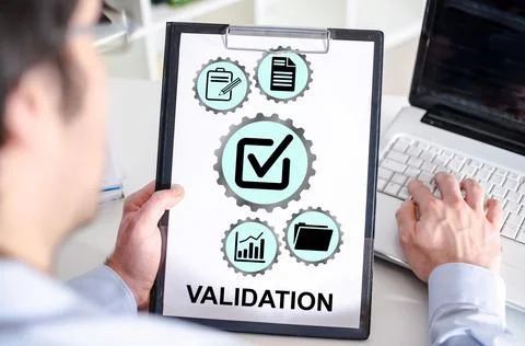 Validation concept on a clipboard Stock Photos
