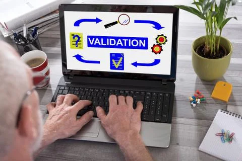 Validation concept on a laptop screen Stockfoto's