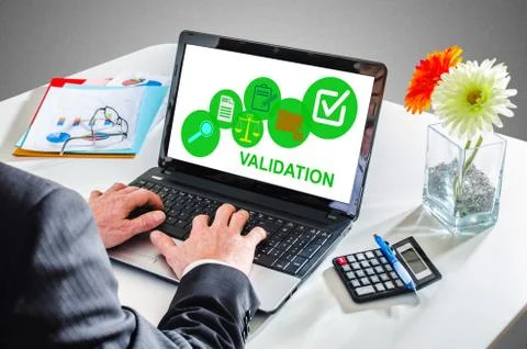 Validation concept on a laptop screen Stock Photos