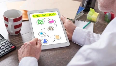 Validation concept on a tablet Stock Photos