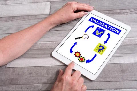 Validation concept on a tablet Stock Photos