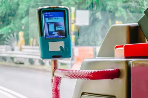 Validator in the city bus for paying using  cards, Public transport Stock Photos
