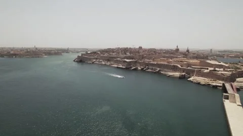 Valletta, Malta Aerial pull back of the bay Stock Footage 248011479