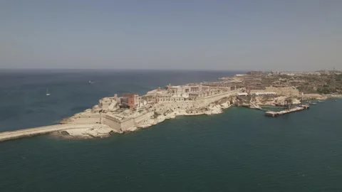 Valletta, Malta Aerial pull back of Fort Ricasoli Stock Footage 248011819