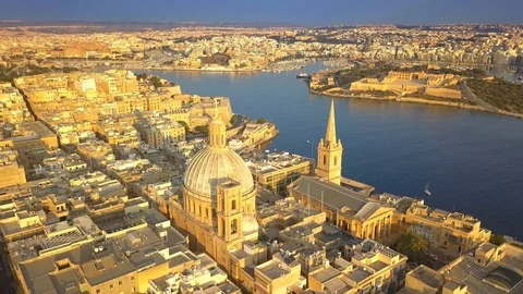 Valletta, Malta - Flying around Mount Carmel Basilica and St.Paul's Cathedral Stock Footage 91785938