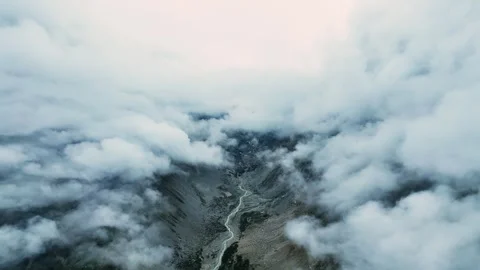 Valley and river between clouds Aerial view Stock Footage 312517477