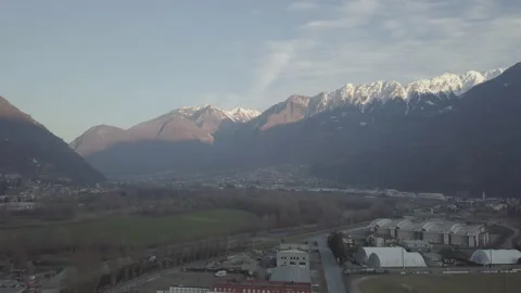 Valley on a background of high alpine mountains, snow-capped peaks shooting from Video stock 149504245