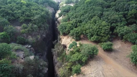Valley Between Two Mountains with Trees on Both Sides Stock Footage 284711285