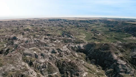 Valley of Drumheller Alberta Dinosaur Provincial park drone Stock Footage 233373961
