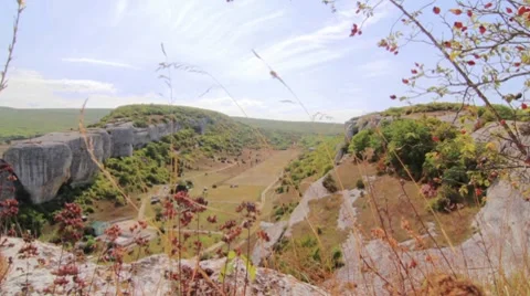Valley with grass in front Stock Footage 8762895