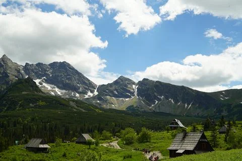 A valley in high mountains Stock Photos