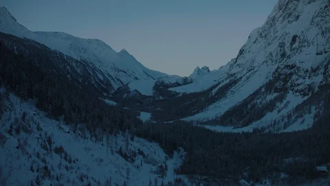 A valley lies in the shadow close to Mt Blanc Stock Footage 101912696