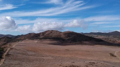 Valley With Mountain Range moving towards Aerial Video stock 82469344