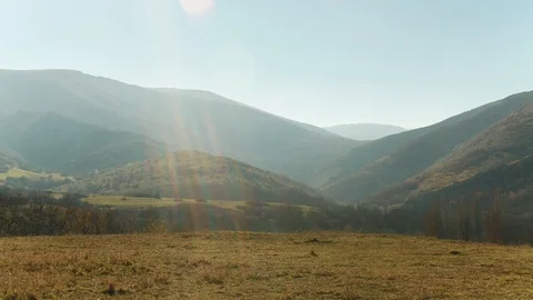 The valley of the mountains in sunlight 스톡 동영상 102251808