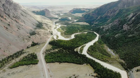 Valley with river twisting between high mountains aerial view. Stock Footage 143561813